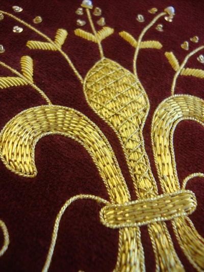 Fleur d' lys embroidery details